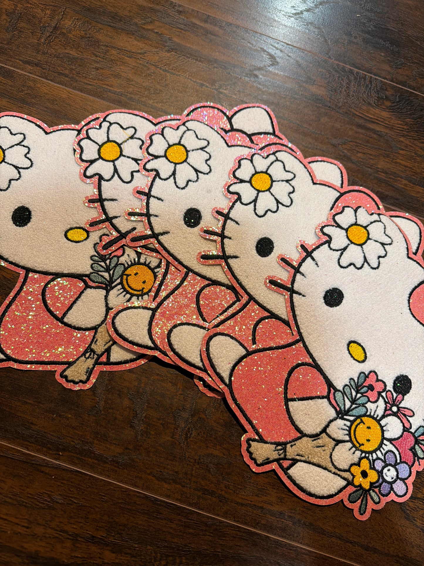 Pink kitty with flowers