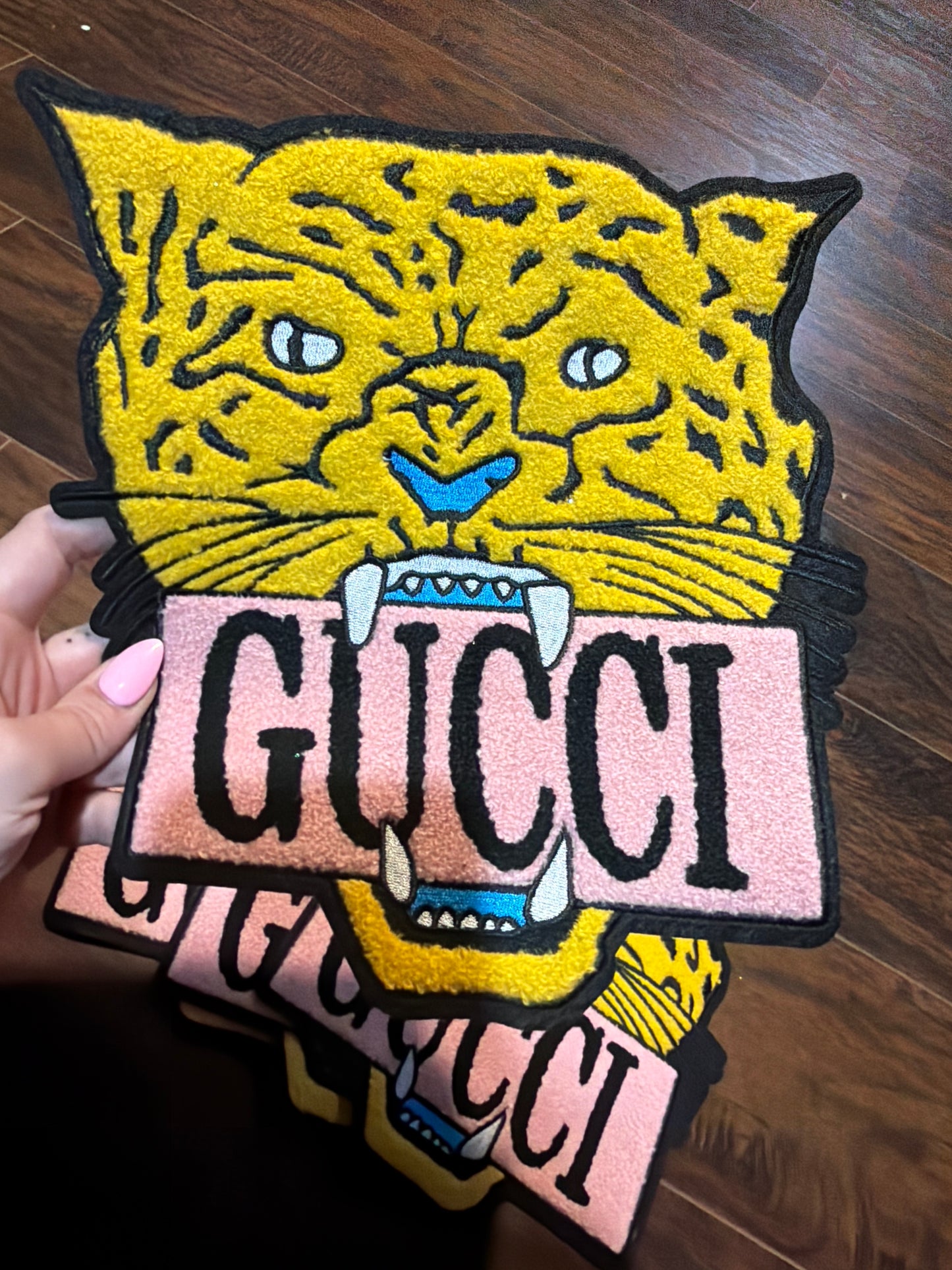 G lion iron on large patch