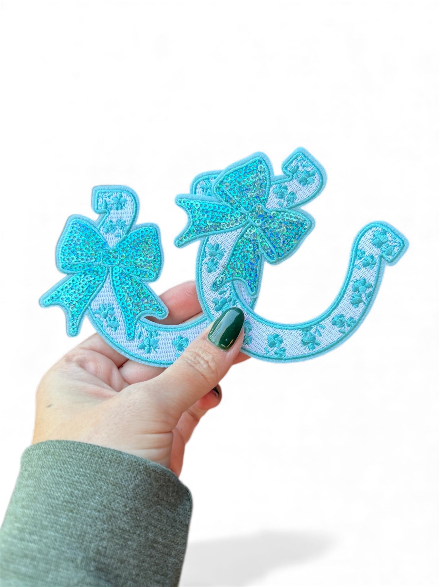 Horseshoe with bow iron on patch green,red, pink and blue