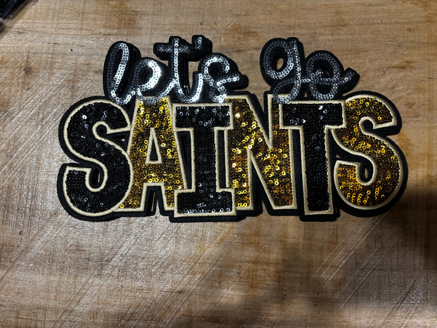 Sequins embroidered Let’s Go Saints