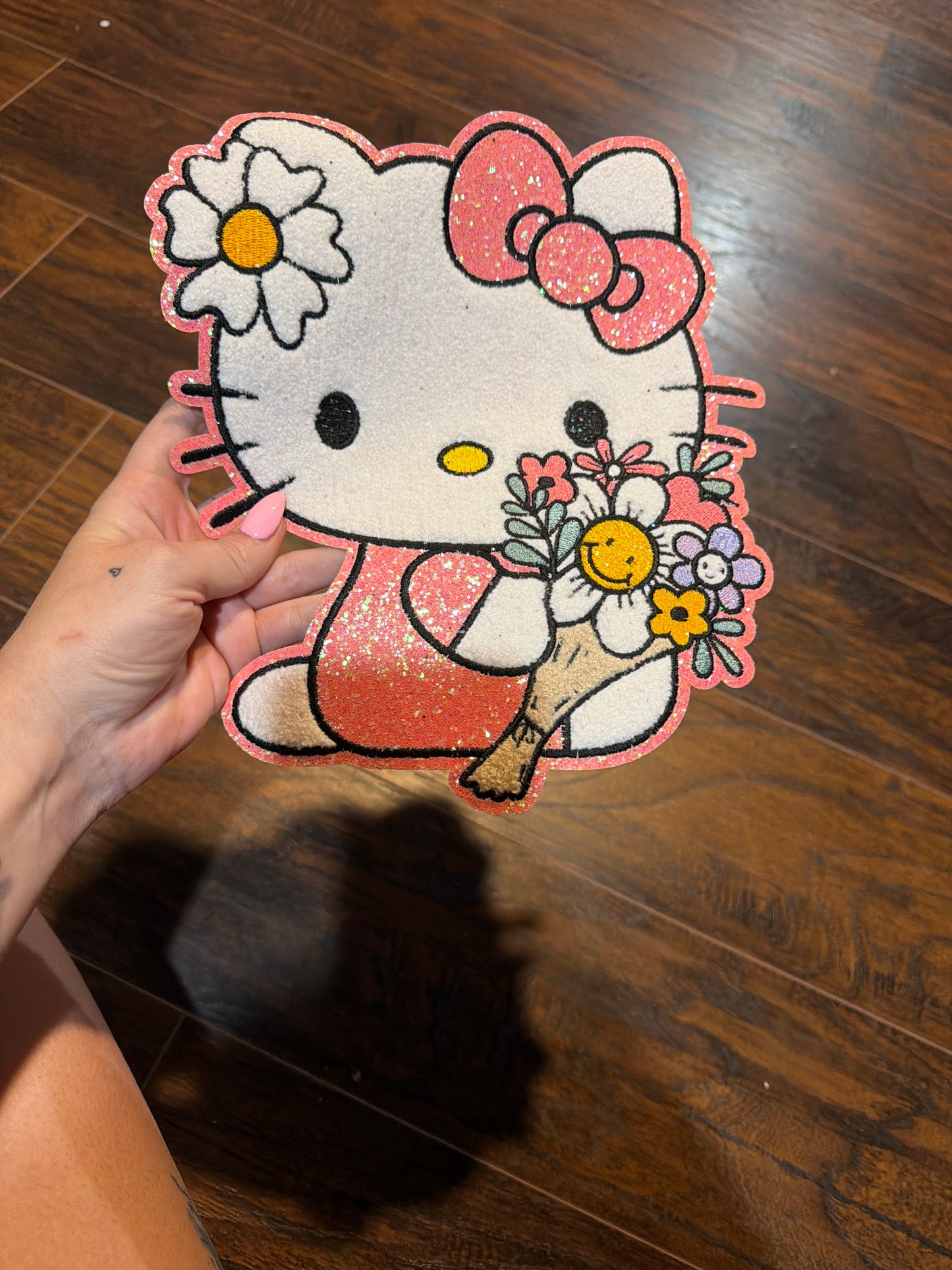 Pink kitty with flowers