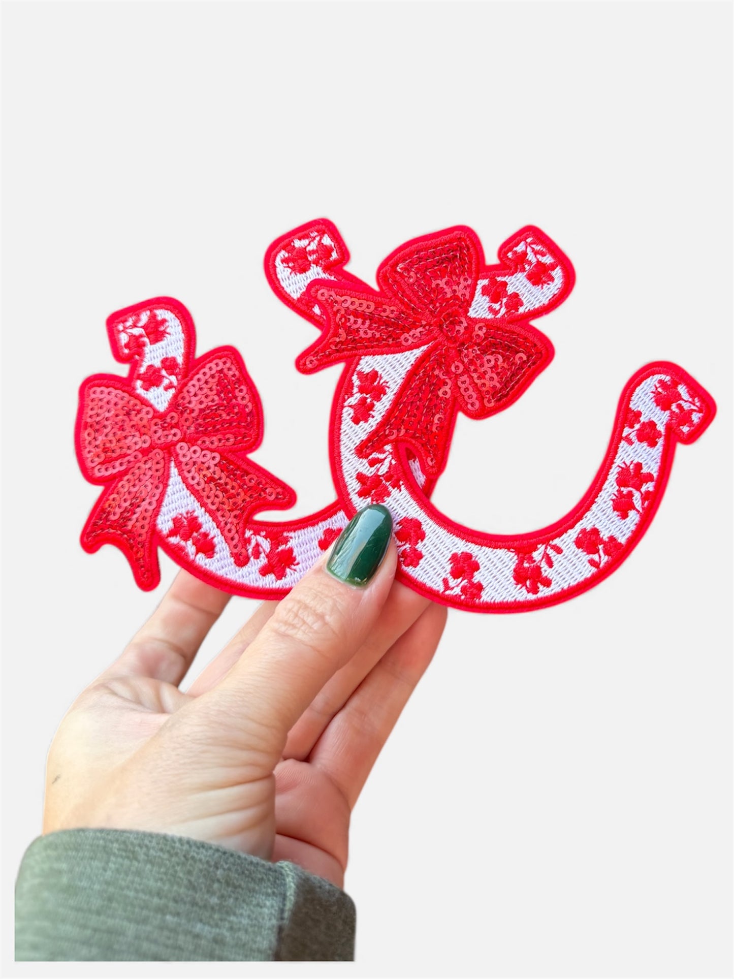 Horseshoe with bow iron on patch green,red, pink and blue