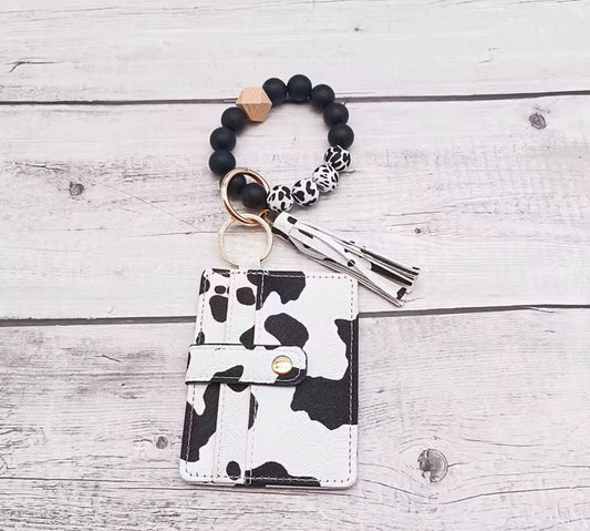 Cow print theme wristlet and 6 card slot wallet