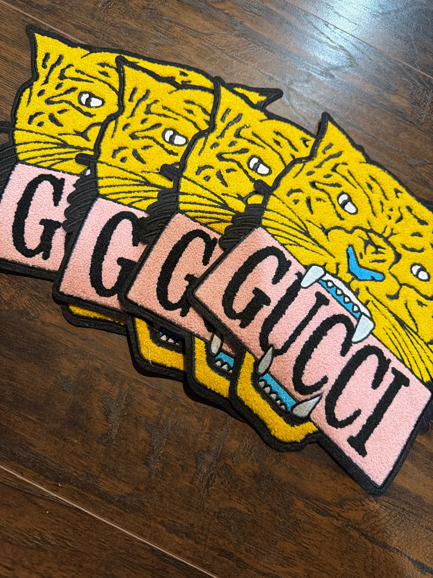 G lion iron on large patch
