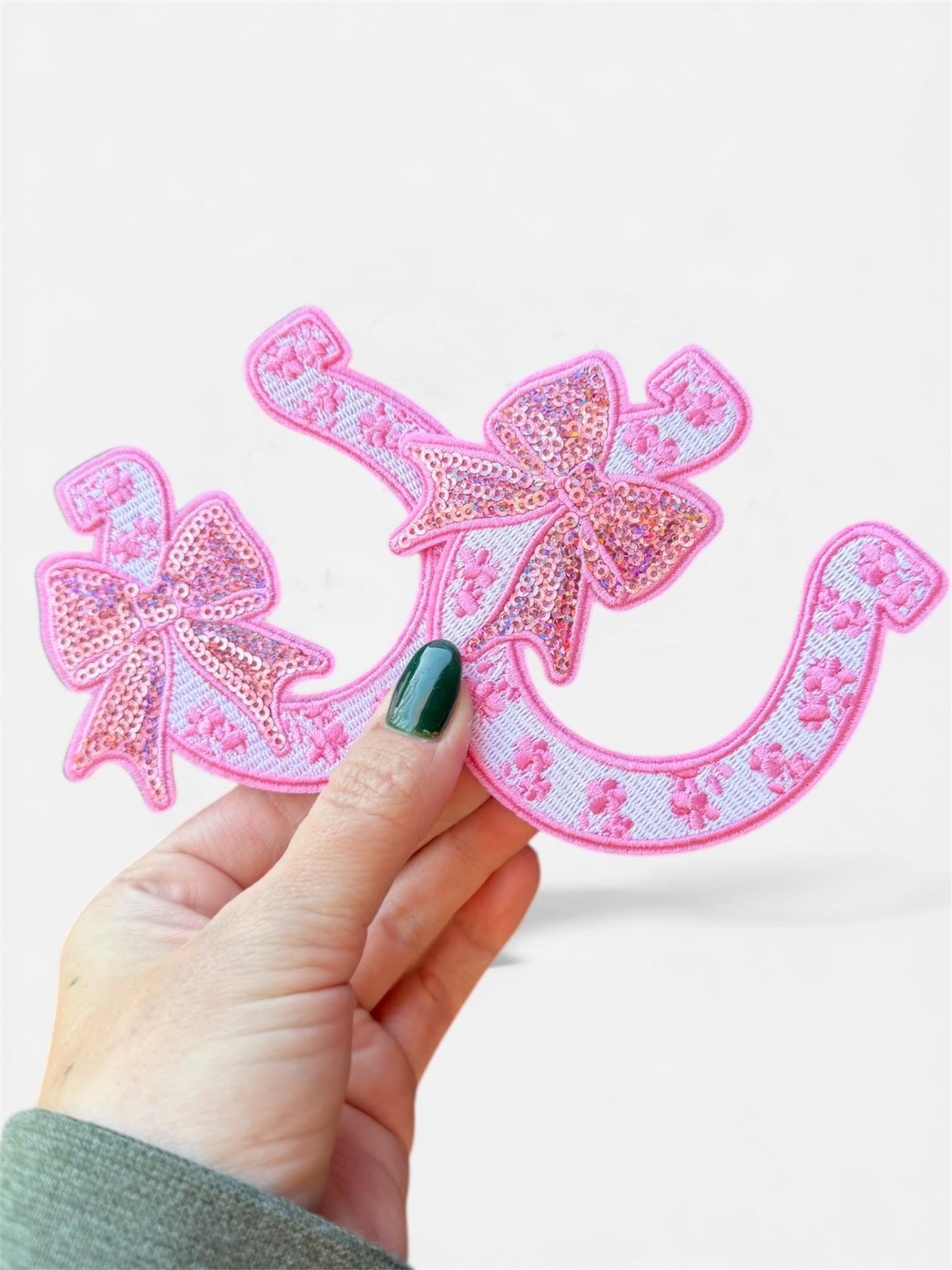 Horseshoe with bow iron on patch green,red, pink and blue