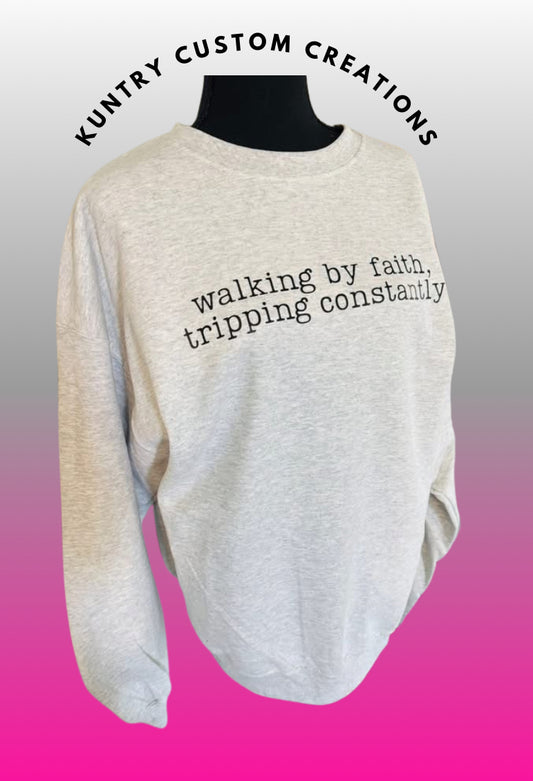 Walking by faith, tripping constantly crewneck