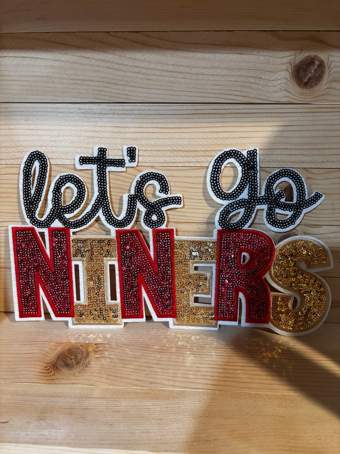 Sequins embroidered Let’s Go Niners