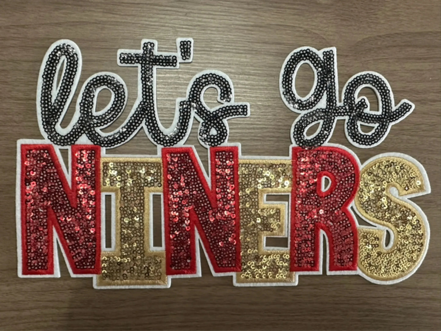 Sequins embroidered Let’s Go Niners